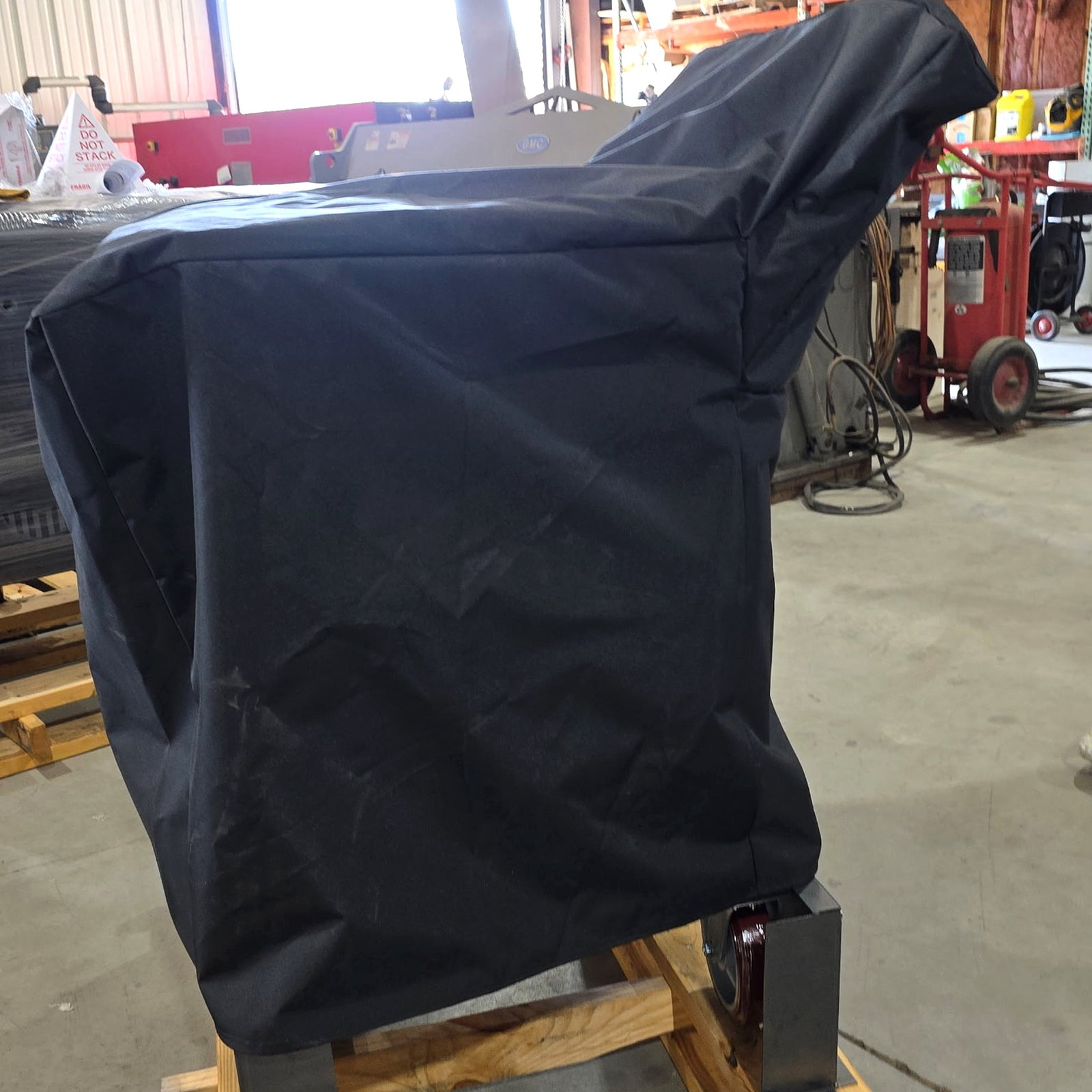Side view of the Mini Smokeslinger Cover with Counterweight fitted over a Mini Smokeslinger, cut to clear the counterweight arm