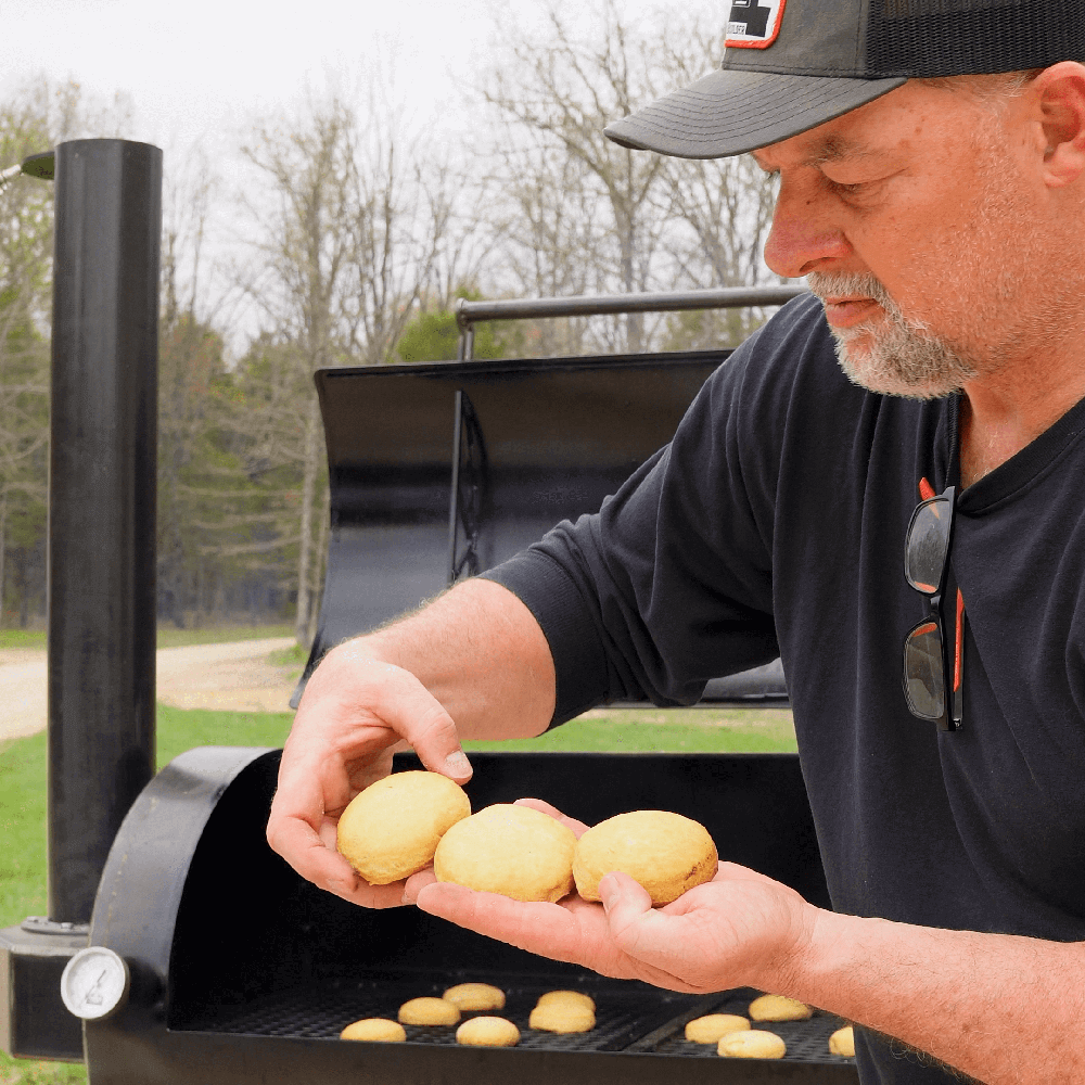 frank with some perfectly cooked biscuits whih was cooked on the Liberty94 Offset smoker during his biscuit test