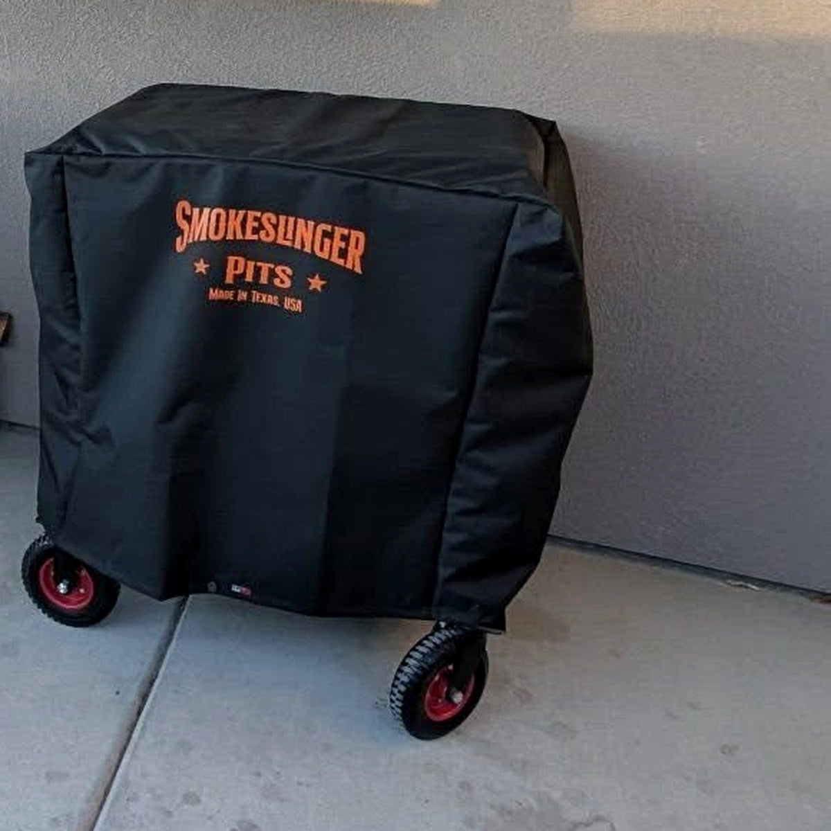 Mini Smokeslinger Cover fitted on a Mini Smokeslinger on a covered patio