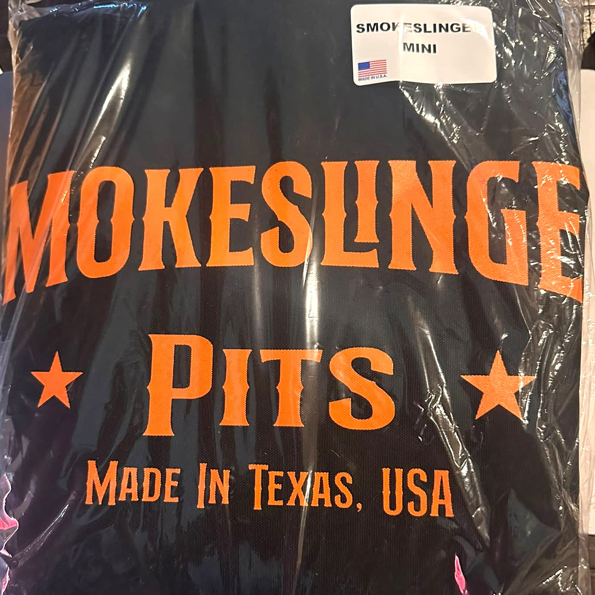 Mini Smokeslinger Cover sealed in packaging with Made in USA label